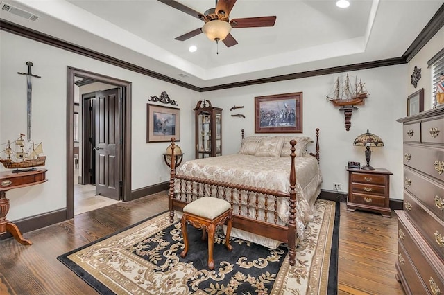 265 Harbor Pointe Dr, Brunswick, GA 31523 - bedroom with a tray ceiling, wood finished floors, baseboards, recessed lighting, and ornamental molding