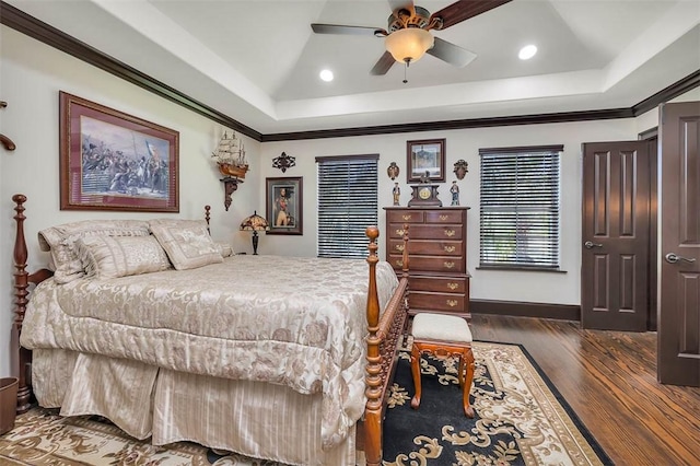 265 Harbor Pointe Dr, Brunswick, GA 31523 - bedroom featuring wood finished floors, a raised ceiling, recessed lighting, crown molding, and baseboards