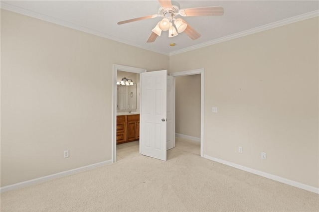 127 Clipper Bay Rd, Brunswick, GA 31523 - unfurnished bedroom featuring light colored carpet, baseboards, ornamental molding, connected bathroom, and ceiling fan