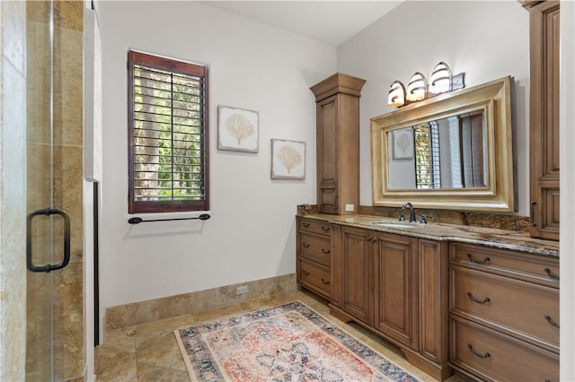 full bath featuring vanity and a stall shower