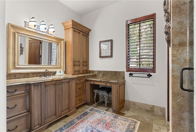 full bath with stone finish floor and vanity