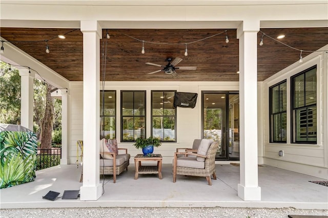 view of patio / terrace featuring ceiling fan