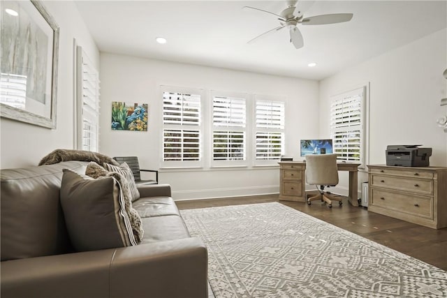 home office featuring ceiling fan and dark hardwood / wood-style flooring