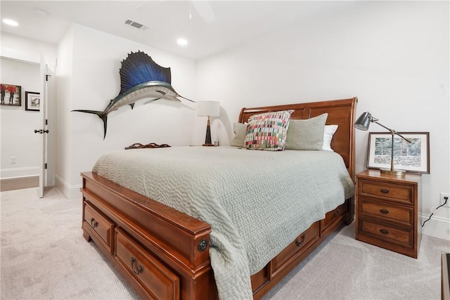 carpeted bedroom with ceiling fan