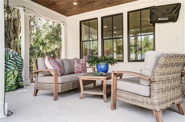 sunroom with wooden ceiling