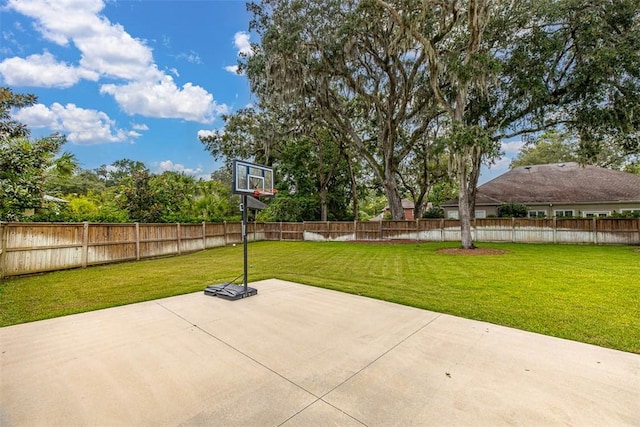 view of patio with basketball hoop