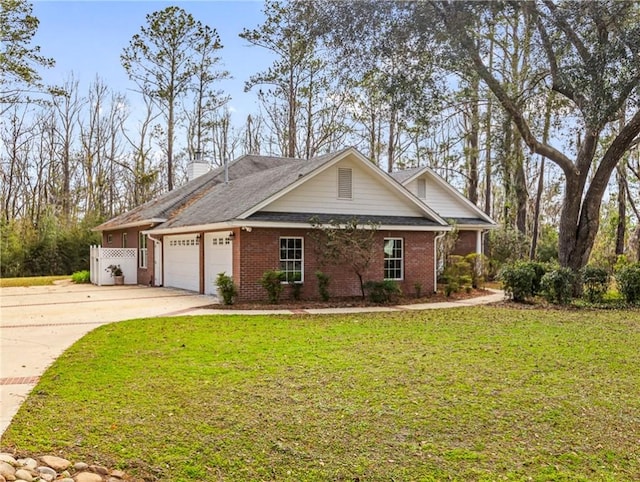 ranch-style home with an attached garage, brick siding, driveway, a chimney, and a front yard