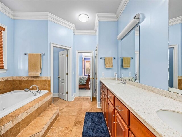 full bathroom featuring tile patterned floors, ensuite bathroom, crown molding, vanity, and tiled tub