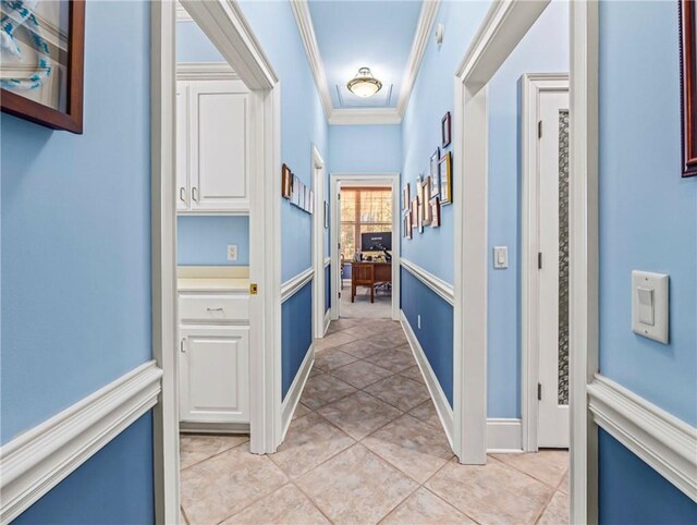 full bathroom featuring shower / bathtub combination with curtain, a sink, toilet, and tile patterned floors