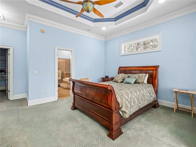 interior details with a tile fireplace and carpet flooring