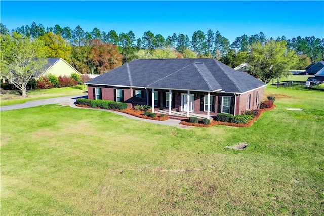 6121 Stoney Brook Dr, Blackshear, GA 31516 - single story home featuring brick siding, a porch, a front yard, and roof with shingles