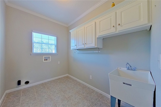 6121 Stoney Brook Dr, Blackshear, GA 31516 - washroom featuring crown molding, baseboards, hookup for a washing machine, cabinet space, and a sink