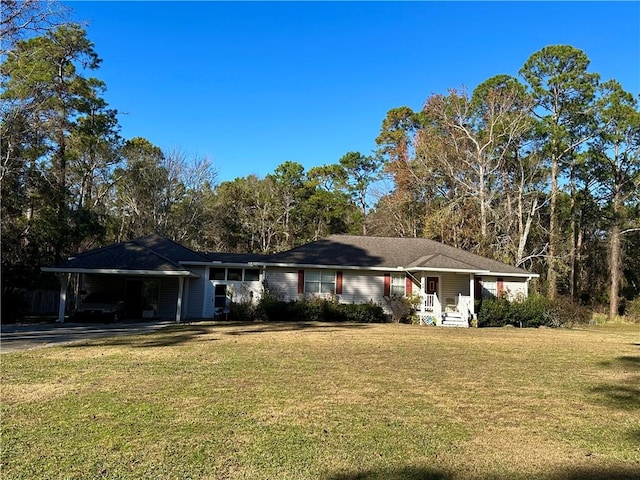 ranch-style house with a front yard and a carport