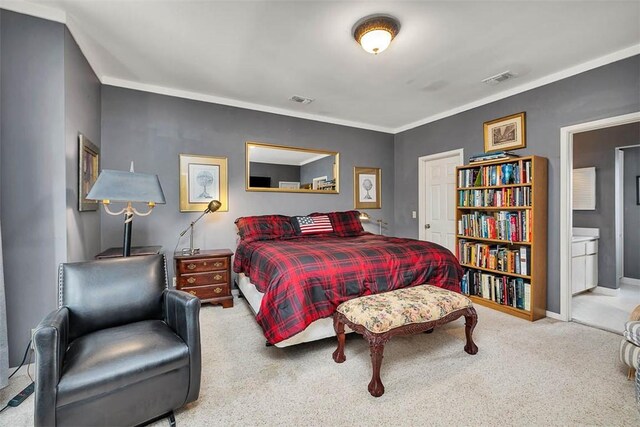 407 Butler Ave, Saint Simons Island, GA 31522 - carpeted bedroom featuring ornamental molding, connected bathroom, and baseboards