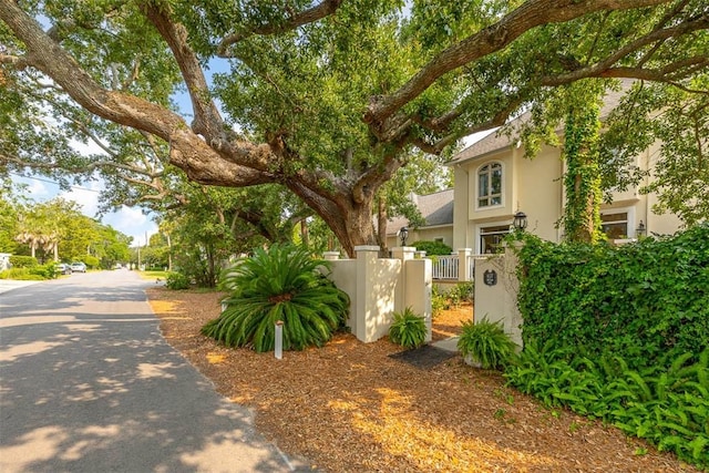 407 Butler Ave, Saint Simons Island, GA 31522 - fenced front yard featuring a gate