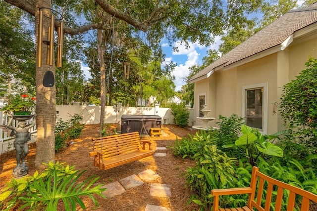407 Butler Ave, Saint Simons Island, GA 31522 - fenced backyard with a hot tub