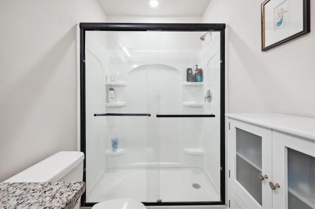 102 Cathead Ln, Darien, GA 31305 - bathroom with toilet and a shower stall