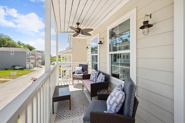 102 Cathead Ln, Darien, GA 31305 - balcony with an outdoor living space and ceiling fan