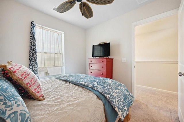 102 Cathead Ln, Darien, GA 31305 - carpeted bedroom with baseboards and a ceiling fan