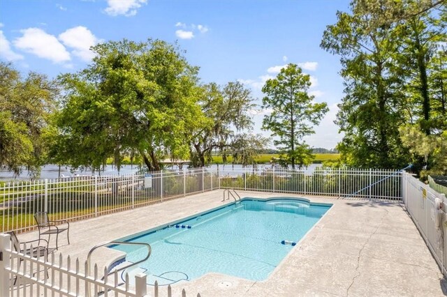 102 Cathead Ln, Darien, GA 31305 - view of swimming pool with a patio, fence, and a fenced in pool