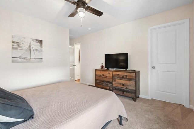102 Cathead Ln, Darien, GA 31305 - carpeted bedroom with a ceiling fan