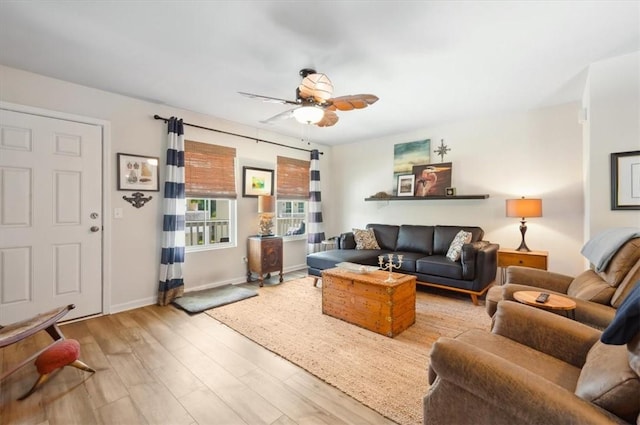 102 Cathead Ln, Darien, GA 31305 - living room featuring a ceiling fan, baseboards, and wood finished floors
