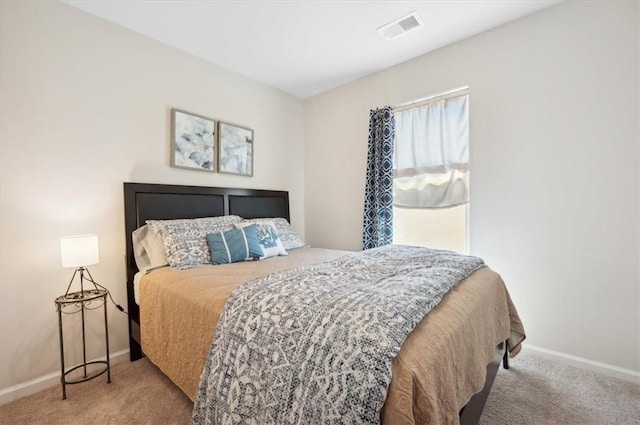 102 Cathead Ln, Darien, GA 31305 - carpeted bedroom with baseboards and visible vents