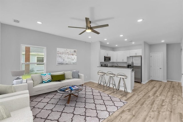 1329 New Castle St, Savannah, GA 31415 - living area featuring light wood-style flooring, ceiling fan, recessed lighting, and baseboards