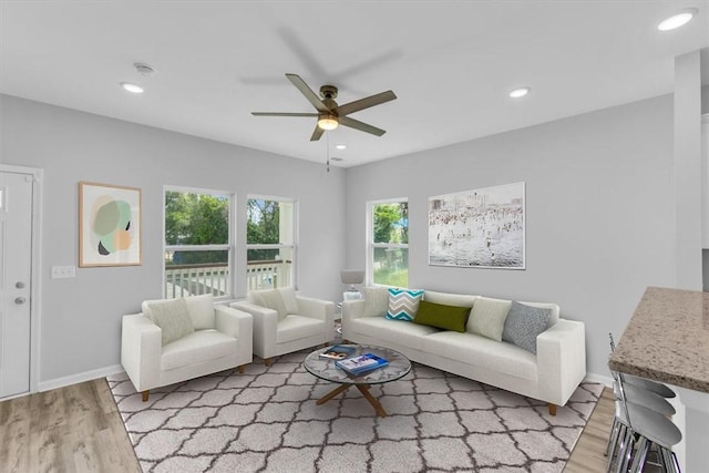1329 New Castle St, Savannah, GA 31415 - living area featuring light wood finished floors, a ceiling fan, recessed lighting, and baseboards