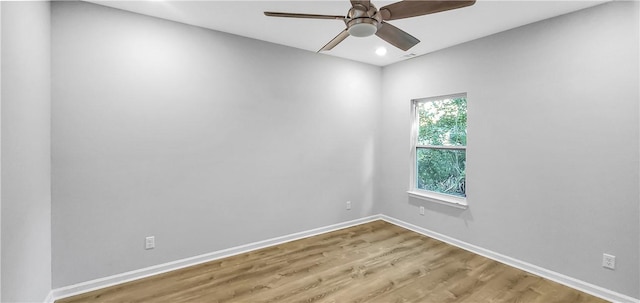 unfurnished room featuring ceiling fan and wood-type flooring