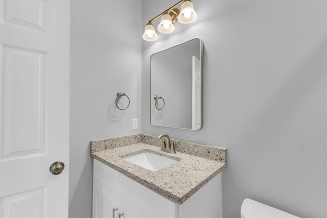 1329 New Castle St, Savannah, GA 31415 - half bathroom featuring vanity and toilet