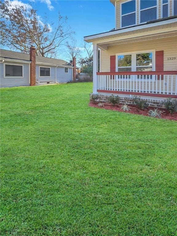 view of yard with a porch