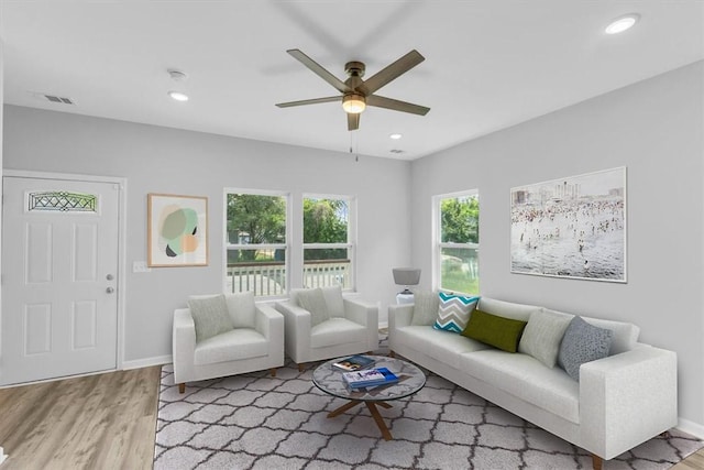 1329 New Castle St, Savannah, GA 31415 - living room with ceiling fan, wood finished floors, baseboards, and recessed lighting