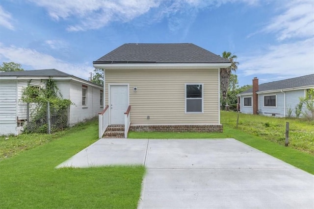 1329 New Castle St, Savannah, GA 31415 - back of house with a yard and a patio