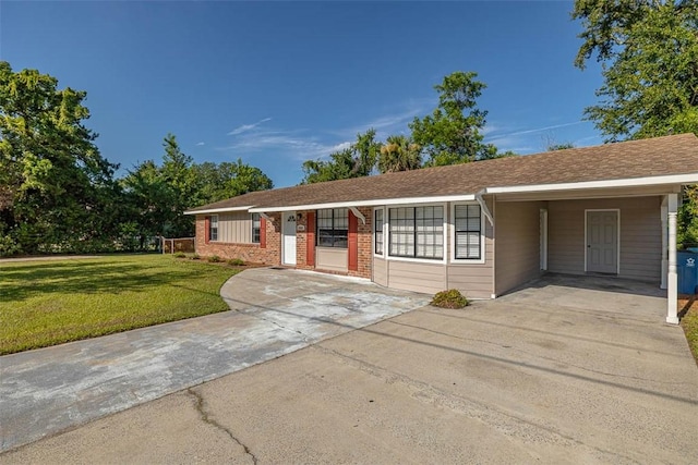 2503 Cleburne St, Brunswick, GA 31520 - single story home featuring a front lawn, concrete driveway, and an attached carport