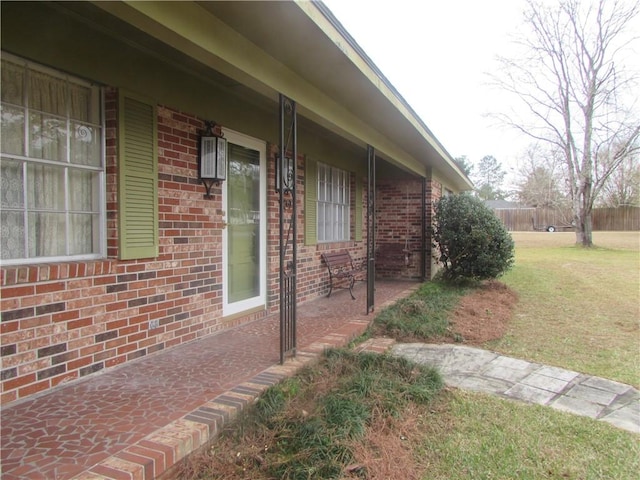 view of home's exterior with a yard