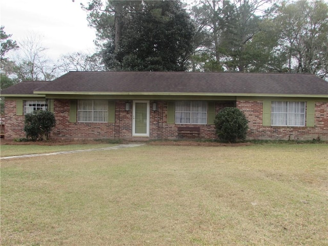 single story home featuring a front yard