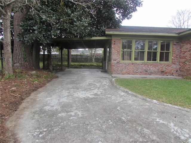 exterior space featuring a carport