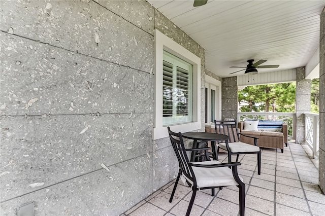 view of patio / terrace featuring ceiling fan