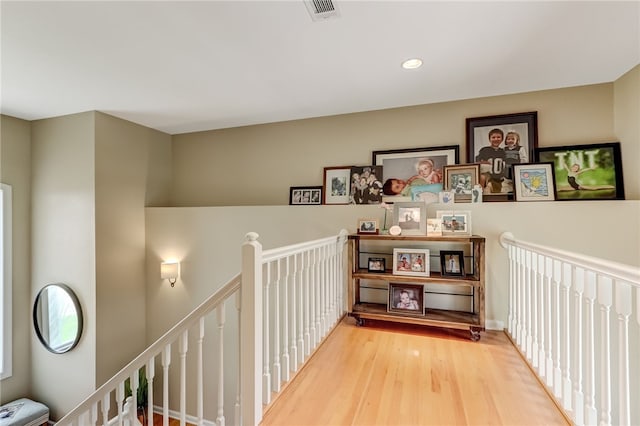 hallway featuring hardwood / wood-style floors