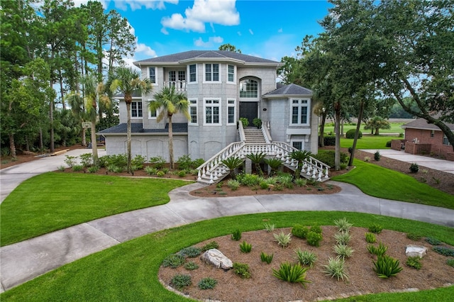 view of front of home with a front lawn