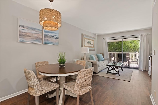 dining space featuring hardwood / wood-style flooring