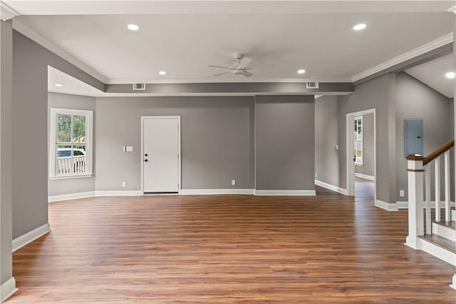 unfurnished living room with wood-type flooring, ceiling fan, and ornamental molding