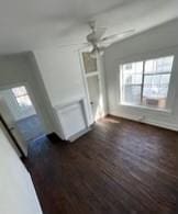 322 Archer St, Waycross, GA 31501 - interior space featuring a ceiling fan and wood finished floors
