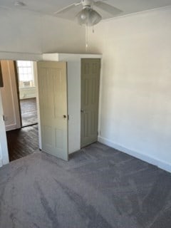 322 Archer St, Waycross, GA 31501 - unfurnished bedroom with baseboards and a ceiling fan