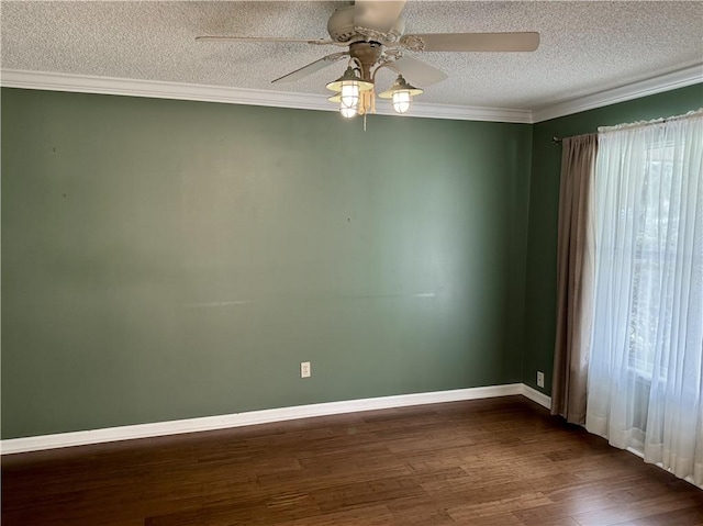 unfurnished room featuring dark wood-type flooring, crown molding, a textured ceiling, and baseboards