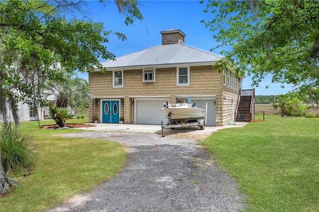 exterior space with a yard and a garage