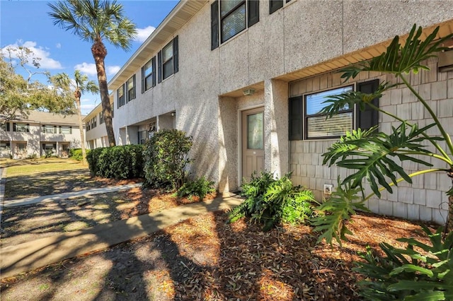 exterior space featuring stucco siding