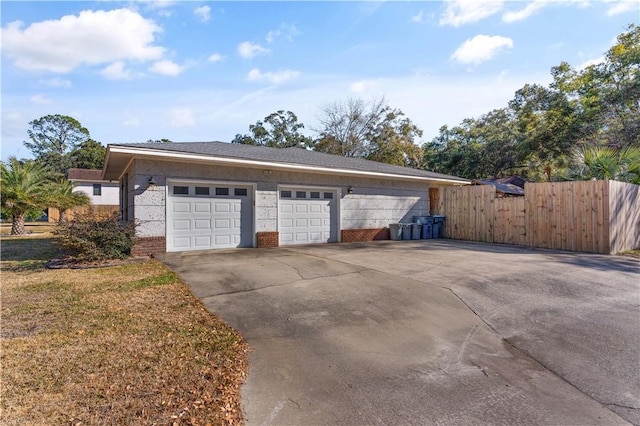 garage with fence