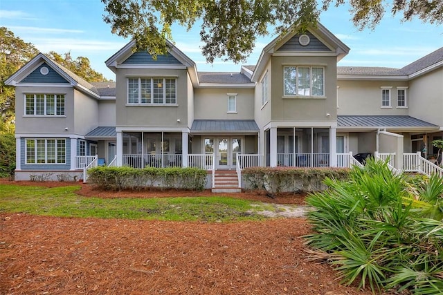 back of property featuring french doors